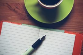 career development tools - a notebook and coffee