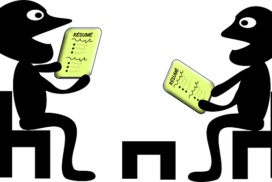 cartoon image of two people sharing their resumes