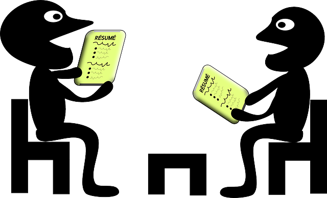 cartoon image of two people sharing their resumes