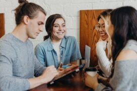 a group of young professionals having coffee