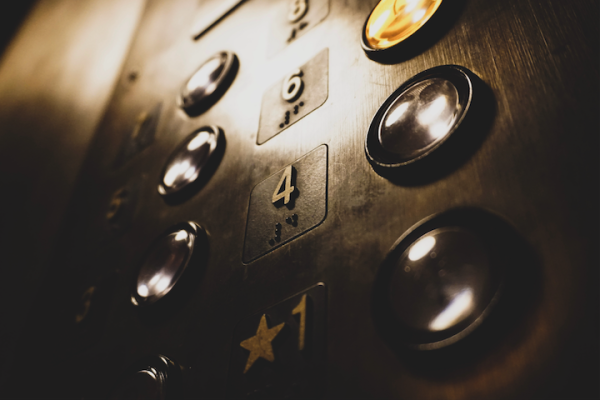 close-up of shiney elevator buttons